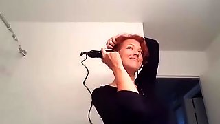 Sexy milf shaves her head