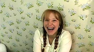 Horny schoolgirl in pigtails with pierced clit gets fucked in bed