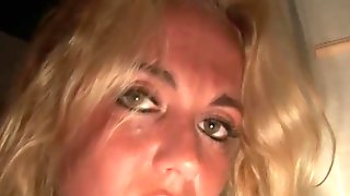 Dutch blonde in a dark room