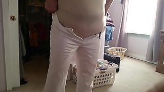 Bbw wife squeezing into tight girdle, big tits